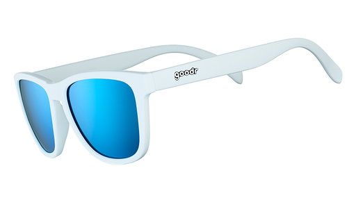 Three-quarter angle view of square-framed white sunglasses with blue reflective polarised lenses.