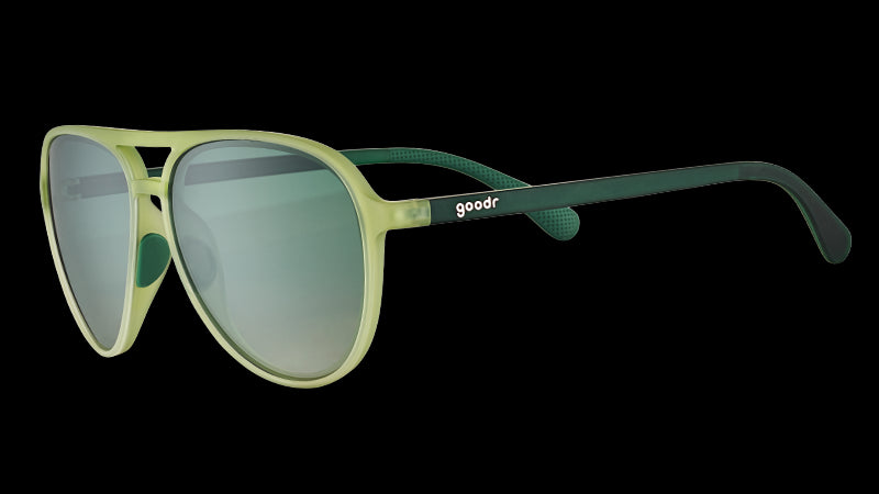 Three-quarter angle view of cadet green translucent aviator sunglasses with gradient green lenses and dark green arms.
