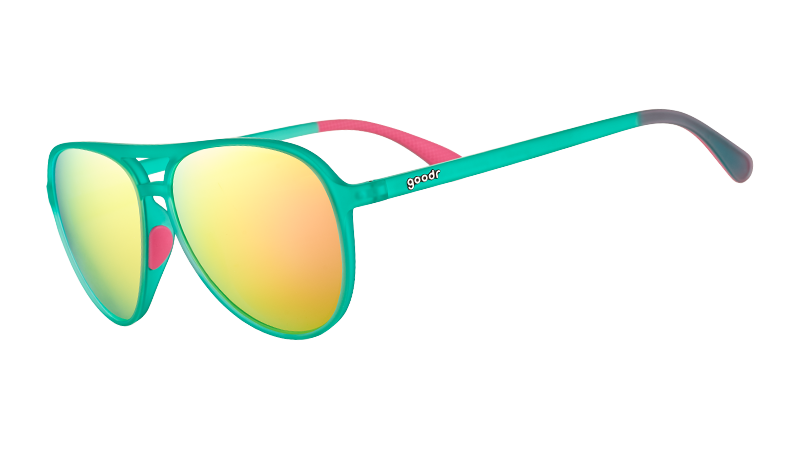 Three-quarter angle view of teal aviator sunglasses with hot pink inner silicone grips and polarised pink reflective lenses.