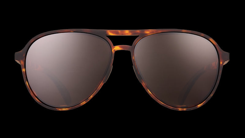 Front view of brown tortoiseshell aviator sunglasses with brown non-reflective lenses on a white background.