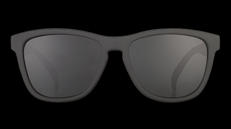 Front view of square-framed black active sunglasses with black lenses.