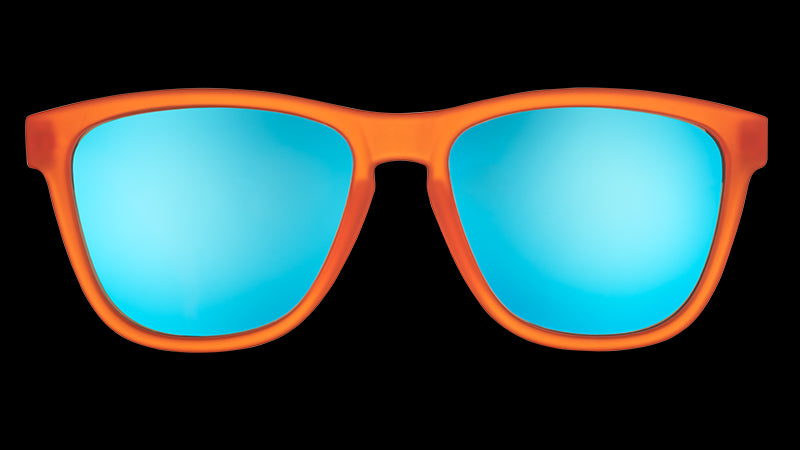 Front view of bright orange sunglasses with blue reflective lenses on a white background.