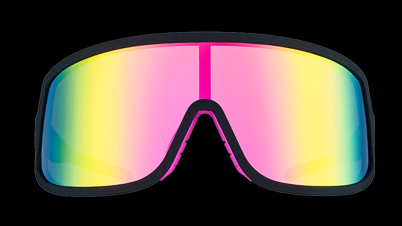 Front view of black wraparound sunglasses with a hot pink reflective single lens and hot pink inner silicone nose grip.