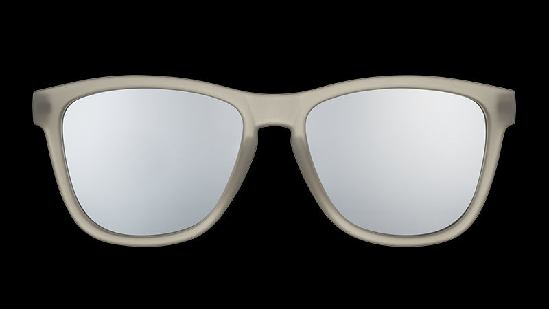 Front view of square-shaped sunglasses with translucent dark gray frames and gray polarised lenses.
