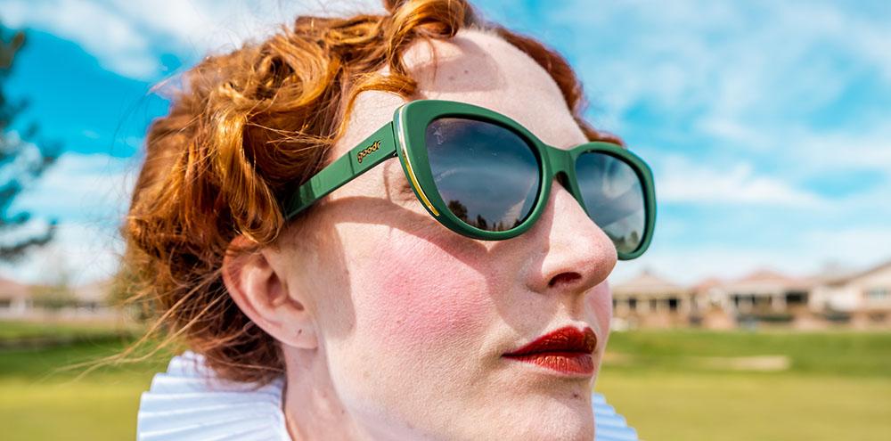 Queen Mary I wearing Goodr Mary Queen of Golf golf sunglasses